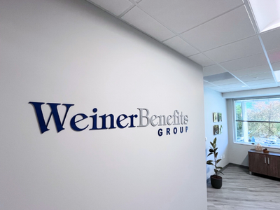 A photo of the WBG sign in the office