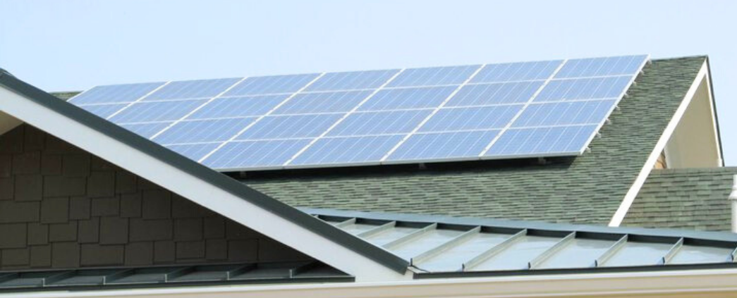 A photo of the solar panels on the roof of the energy house.