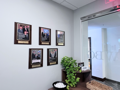 A wall showing all of WBG's award plaques