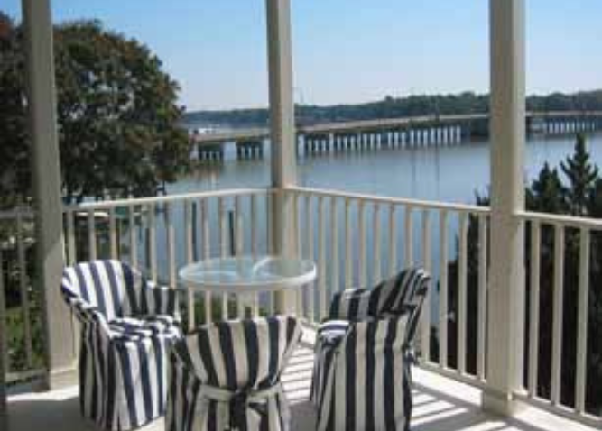 A photo of the porch of the waterfront condos facing the water