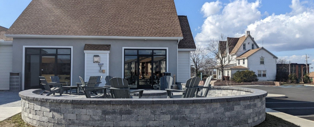 A photo of a fire pit gathering area at Christiana Meadows