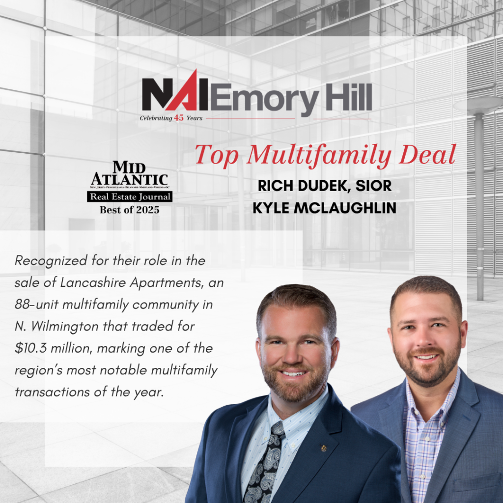A photo of Rich Dudek and Kyle McLaughlin's recognition for Top Multifamily Deal.