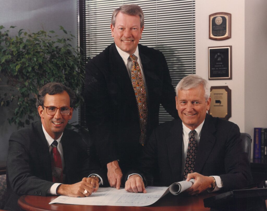 A photo of Emory Hill founders Carmen Facciolo, Bob Hill, and Clay Emory