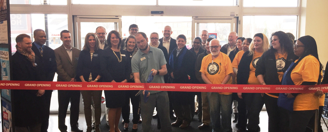 A picture of a ribbon-cutting ceremony for a Goodwill retail store