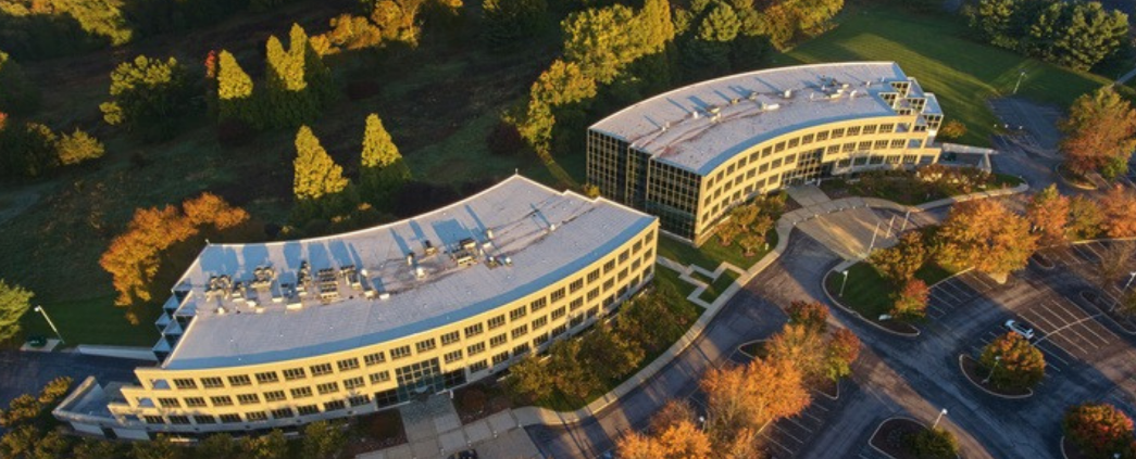 An aerial photo of the Little Falls buildings