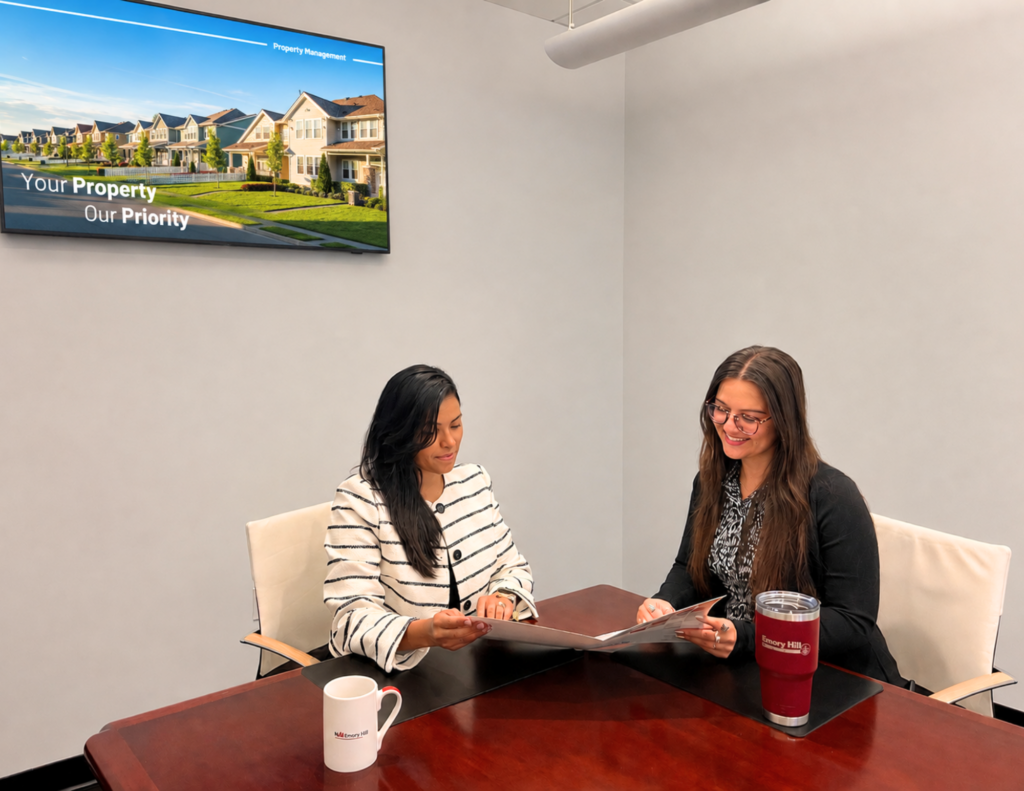 A picture of Massi and Maria in the conference room.