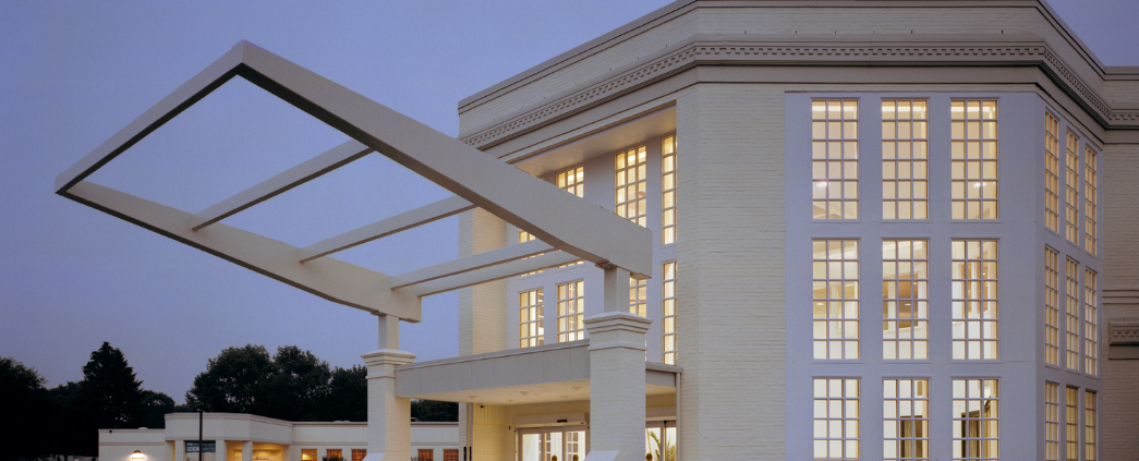 Exterior of the Neurosciences building at twilight