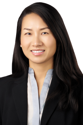 A professional headshot portrait of Zuhua Jenny Sabol.